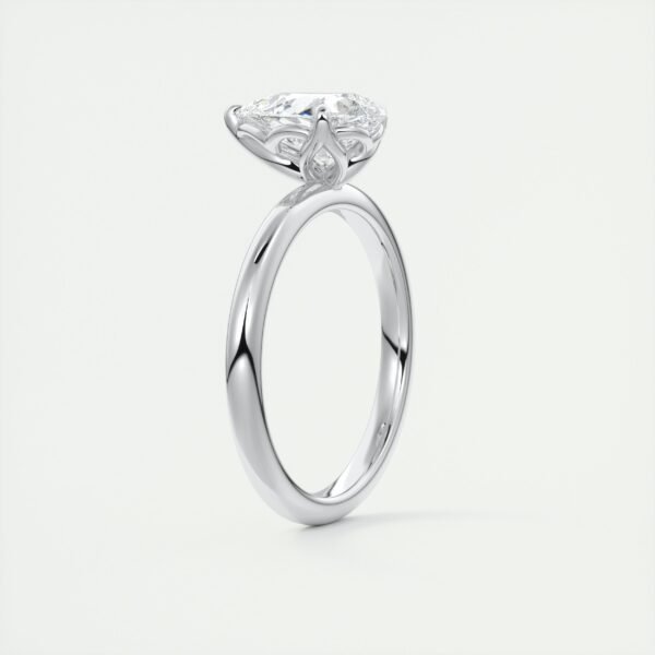 Pear-Shaped Diamond Solitaire Ring with Side Diamonds - Image 12